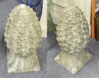 Lot 1288 - A pair of reproduction pine cone garden finials