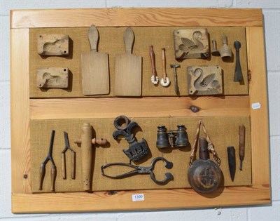 Lot 1300 - A group of early 19th century treen and other implements including butter pats, shortbread...