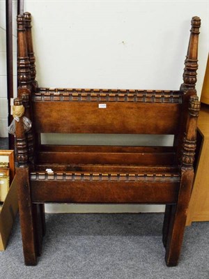 Lot 1329 - Two carved single bed frames