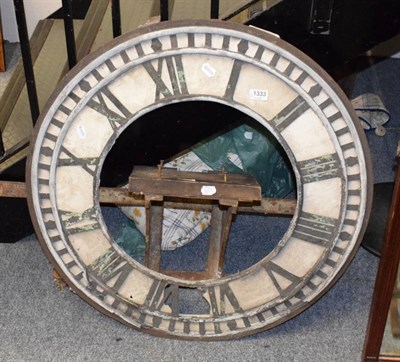 Lot 1333 - A large clock chapter ring and movement bracket, early 20th century