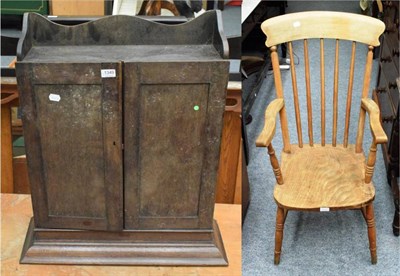 Lot 1349 - A hanging wall cupboard and a kitchen armchair