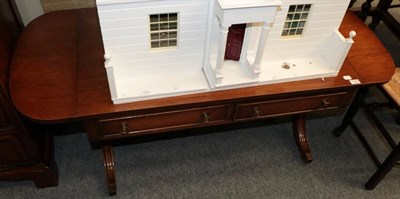 Lot 1358 - A drop end coffee table