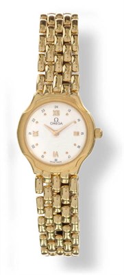 Lot 639 - A Lady's 18ct Gold Wristwatch, signed Omega, quartz movement, white dial with Roman and dot...