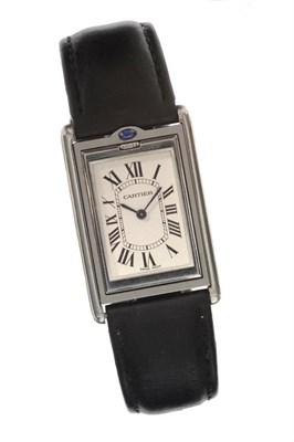 Lot 643 - A Stainless Steel Reversible Wristwatch, signed Cartier, Model: Basculante, circa 2000,...