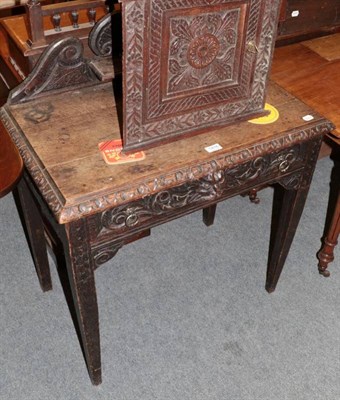 Lot 1416 - A Victorian oak carved single drawer side table and a small Victorian carved corner cupboard