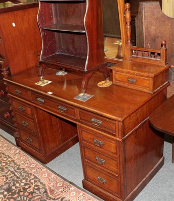 Lot 1419 - A late 19th century kneehole dressing chest