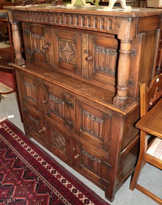 Lot 1425 - An oak court cupboard