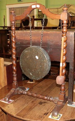 Lot 1430 - A gong on stand, with beater