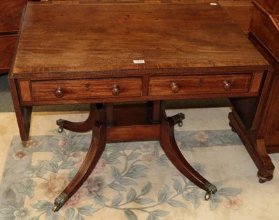 Lot 1438 - A George III crossbanded mahogany sofa table