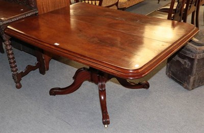 Lot 1440 - A Victorian mahogany loo table, the moulded rectangular top raised on a pedestal base with four...