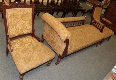 Lot 1451 - Late Victorian walnut framed drawing room suite comprising a chaise longue, and a lady and...