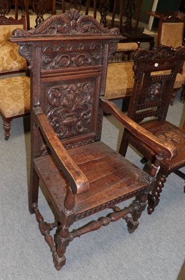 Lot 1452 - Victorian carved oak armchair with carved top rail and boarded seat