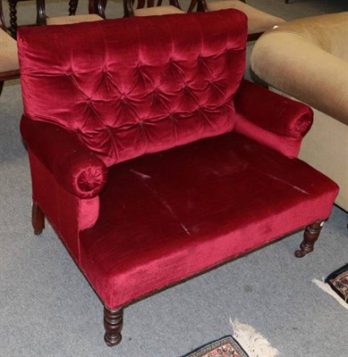 Lot 1456 - A small button back settee upholstered in red velvet