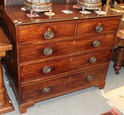 Lot 1468 - A Georgian mahogany chest of drawers