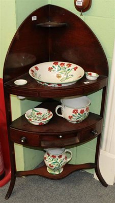 Lot 1487 - A George III mahogany corner washstand fitted with a group of Maling toilet wares