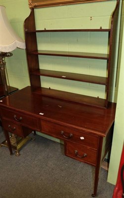 Lot 1489 - An inlaid mahogany writing table