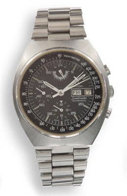 Lot 658 - A Stainless Steel Automatic Calendar Chronograph Wristwatch with 24-hour dial, signed Omega, Model