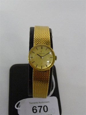 Lot 670 - A Lady's 18ct Gold Wristwatch, signed Omega, 1965, (calibre 620) 17-jewel lever movement...