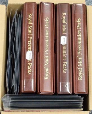 Lot 302 - GB Presentation Packs 1970 to 2007 in 4 large albums. About 240 packs in 4 Royal Mail albums...