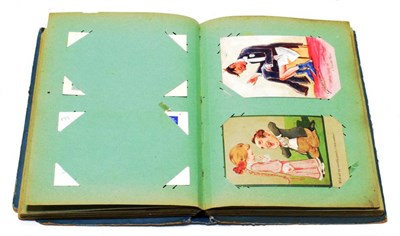 Lot 356 - Vintage Album Of Comic Postcards - An attractive but damaged album with an interesting...