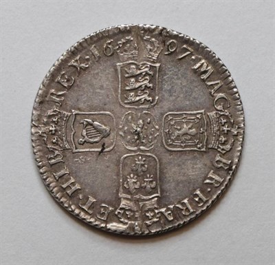 Lot 96 - William III (1694-1702), Shilling, 1697, first draped bust, possibly E/A in DEI, (S.3497)....