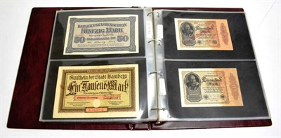 Lot 207 - An album of World banknotes including notes from Russia, China, Indonesia, Hungary, France, Greece