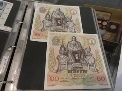 Lot 207 - An album of World banknotes including notes from Russia, China, Indonesia, Hungary, France, Greece