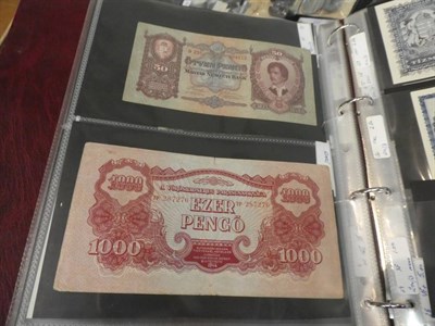 Lot 207 - An album of World banknotes including notes from Russia, China, Indonesia, Hungary, France, Greece