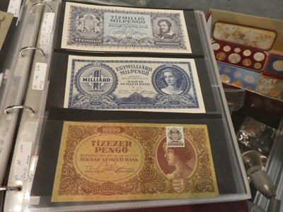 Lot 207 - An album of World banknotes including notes from Russia, China, Indonesia, Hungary, France, Greece