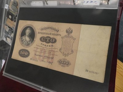 Lot 207 - An album of World banknotes including notes from Russia, China, Indonesia, Hungary, France, Greece