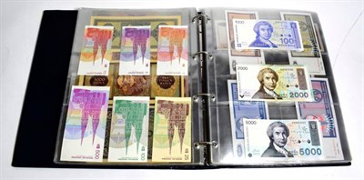 Lot 209 - An album containing approx. 174 banknotes from Albania, Bosnia, Serbia, Bulgaria, Hungary, Croatia