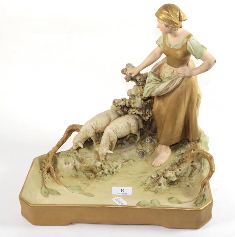 Lot 8 - A Royal Dux pastoral group, girl with sheep