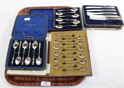 Lot 26 - Two sets of six silver apostle spoons, cased; twelve silver coffee bean spoons, cased; and six...