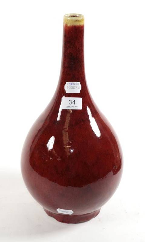 Lot 34 - A Chinese sang de boeuf bottle vase, 40cm high