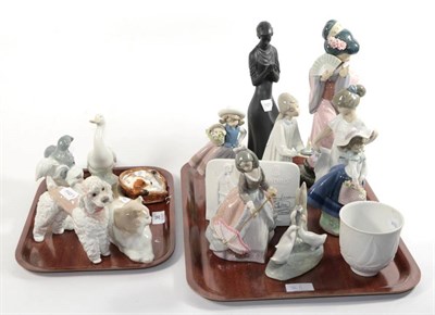 Lot 36 - A collection of Lladro including Geisha girl, girl with parasol and other figures etc; together...