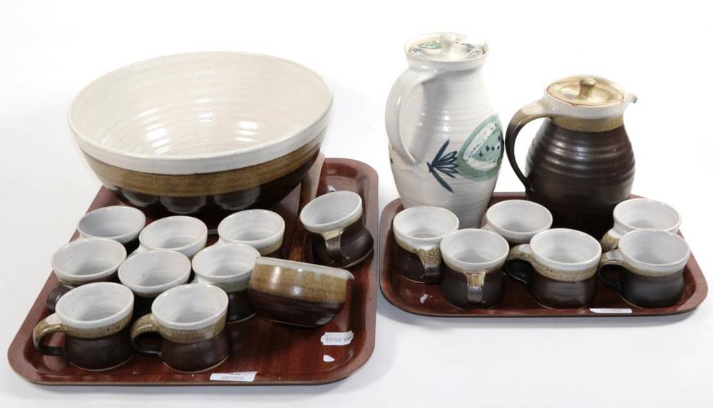Lot 42 - Two trays of Marianne De Trey studio home wares comprising two lidded jugs and a punch set