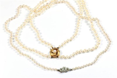 Lot 48 - Two cultured pearl necklaces, one with clasp stamped '750', lengths 43cm and 54cm (2)