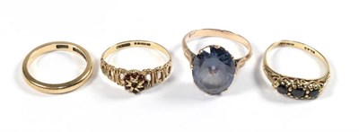 Lot 64 - An amethyst ring, stamped '9C', finger size P; two 9 carat gold gem set rings, finger size N, other