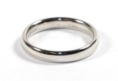 Lot 84 - A platinum band ring, finger size L1/2