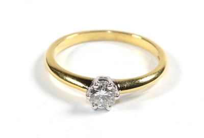 Lot 87 - An 18 carat gold solitaire diamond ring, a round brilliant cut diamond in a claw setting, estimated