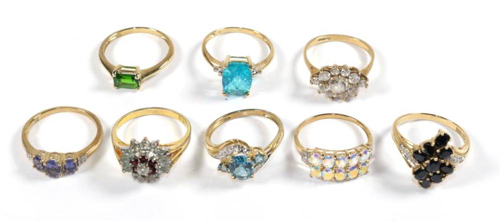 Lot 88 - Seven 9 carat gold gemset dress rings, various sizes; together with another indistinctly...