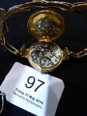 Lot 97 - A ladies 9 carat gold enamel half hunter cased wristwatch