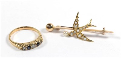 Lot 112 - A bird bar brooch, length 4cm; and a sapphire and diamond ring, stamped '18CT', finger size...