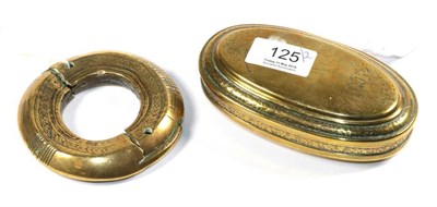 Lot 125 - A Dutch brass tobacco box and hinged cover, late 18th century, of oval form engraved with...
