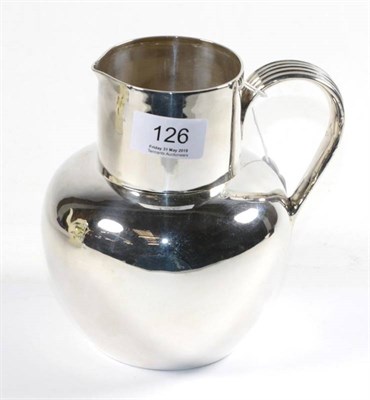 Lot 126 - A late Victorian silver water or beer jug, Plante & Co, Birmingham 1898, with reeded handle, 15.5cm
