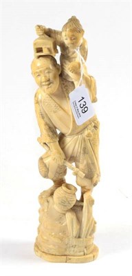 Lot 139 - A 19th century carved ivory okimono