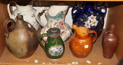 Lot 158 - An Ironstone pewter topped jug, Victorian wash jugs, earthenware flasks, etc
