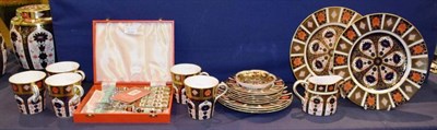 Lot 175 - A group of Royal Crown Derby Imari comprising five mugs; six side plates; two dinner plates;...