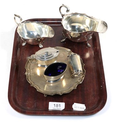 Lot 181 - A group of silver items comprising two early 20th century sauceboats, largest sauceboat 15cm...