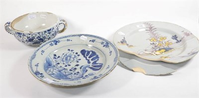 Lot 186 - An 18th century Delft two handled bowl; and two tin glazed dishes